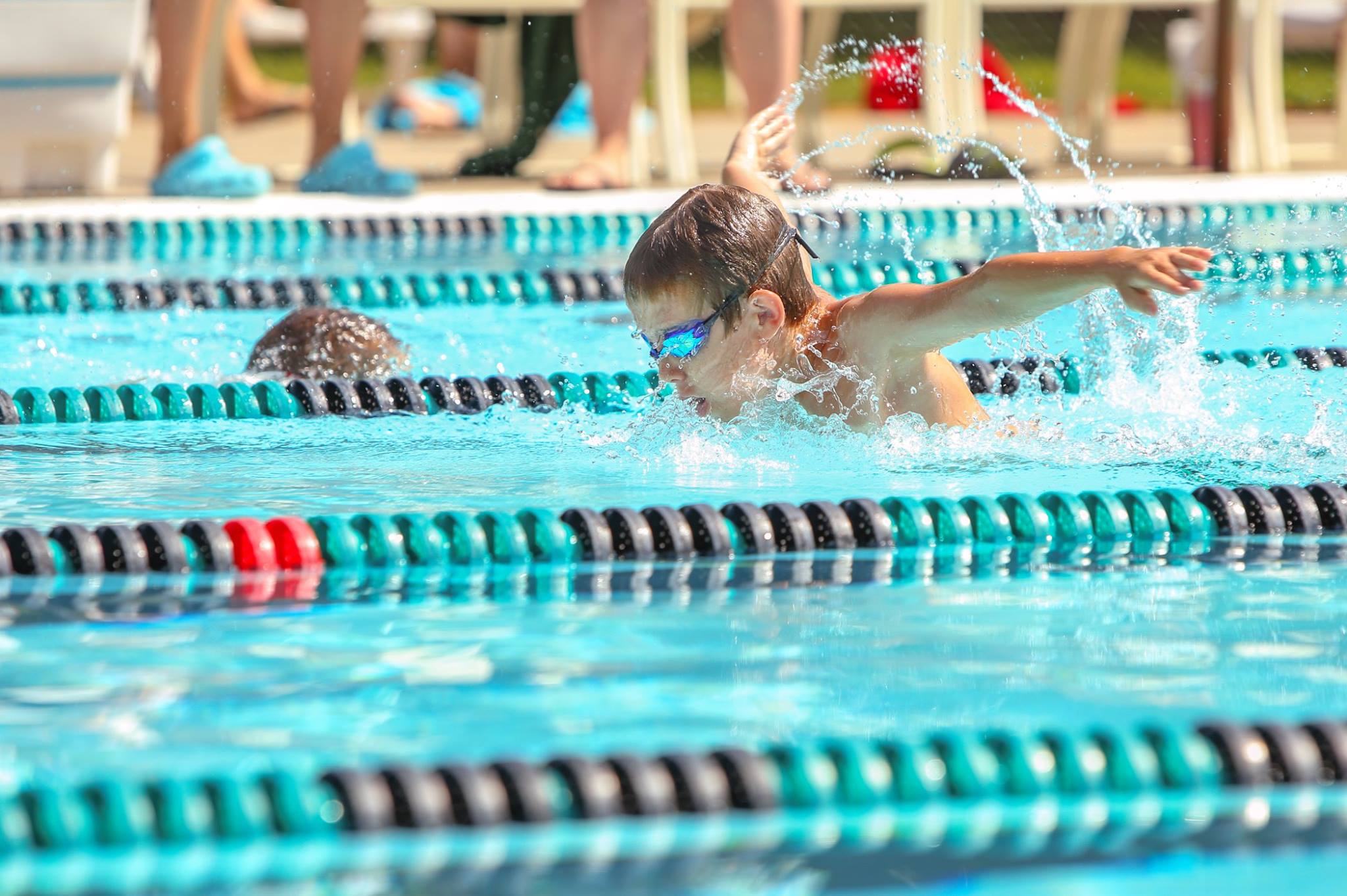 29355237_10155117492541370_6468118219417771168_o Young swimmer practicing freestyle stroke in competition lanes at Nova Swim School