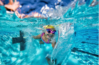 freestyle Swimmer performing freestyle stroke during practice at Nova Swim School